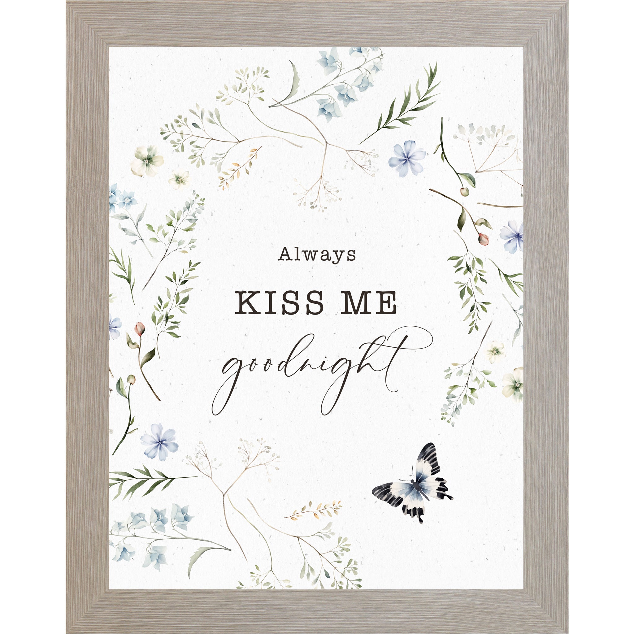 Floral wreath wall art with the words “Always Kiss Me Goodnight” on a soft white background with greenery and a butterfly.