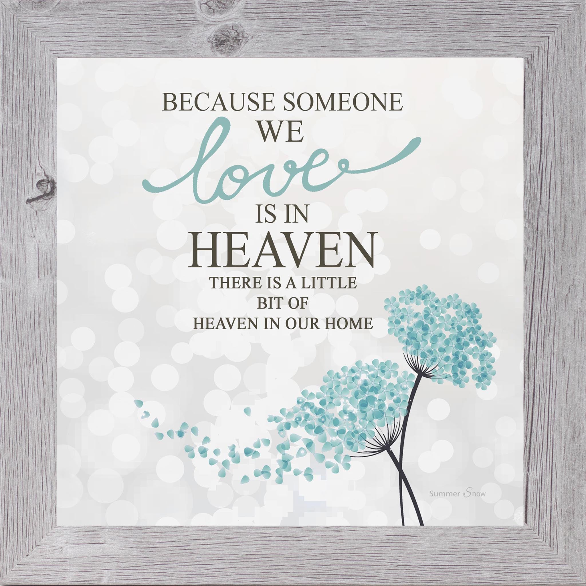 Square framed sympathy wall art with the words Because Someone We Love Is in Heaven on a soft gray background with white light orbs and subtle floral accents