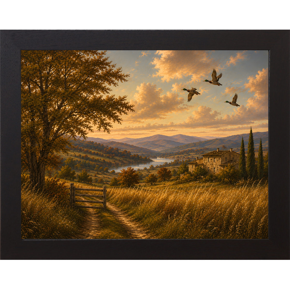 Black framed landscape vintage sporting wall art featuring mallards flying over a golden river valley with a distant countryside villa