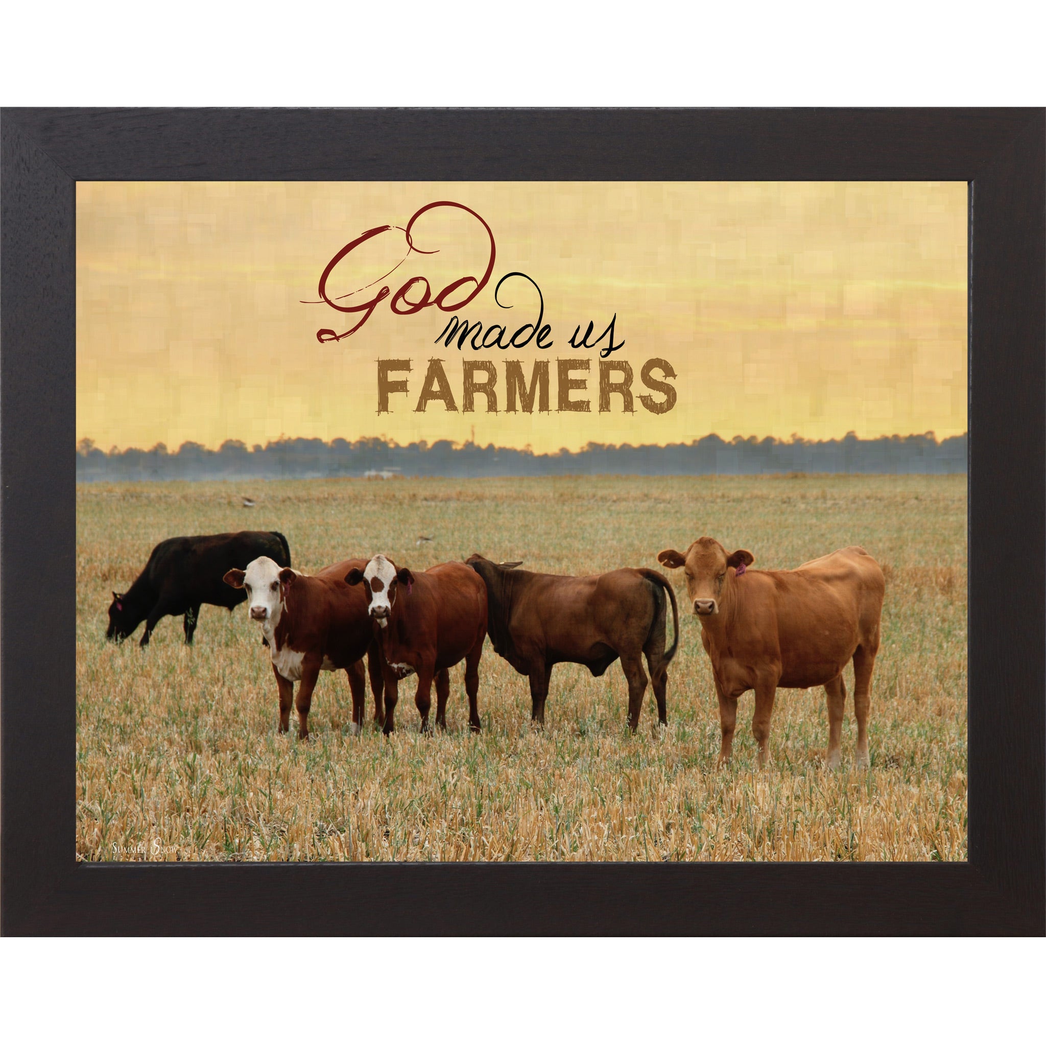 Black framed horizontal farmhouse landscape wall art with cattle grazing in a golden field at sunset with the words "God Made Us Farmers"