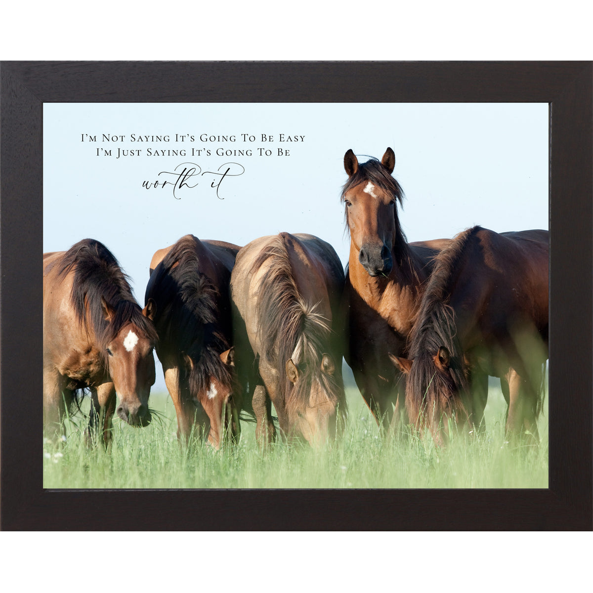 Black framed landscape inspirational horse wall art with four bay horses grazing in a green summer field with the quote I'm Not Saying It's Going to Be Easy I'm Just Saying It's Going to Be Worth It
