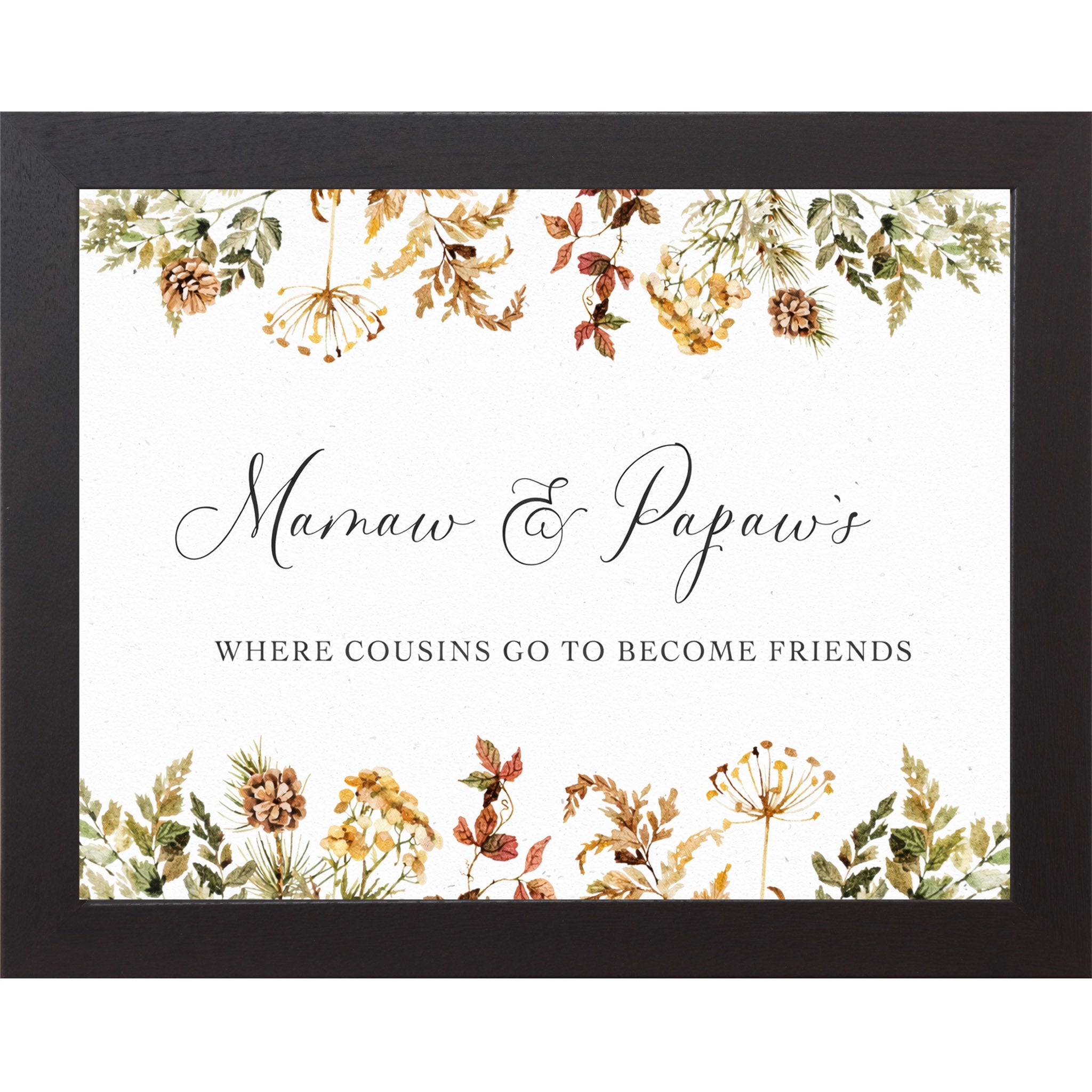 Black framed landscape family wall art with autumn botanical border and the words "Mamaw and Papaw's Where Cousins Go to Become Friends"