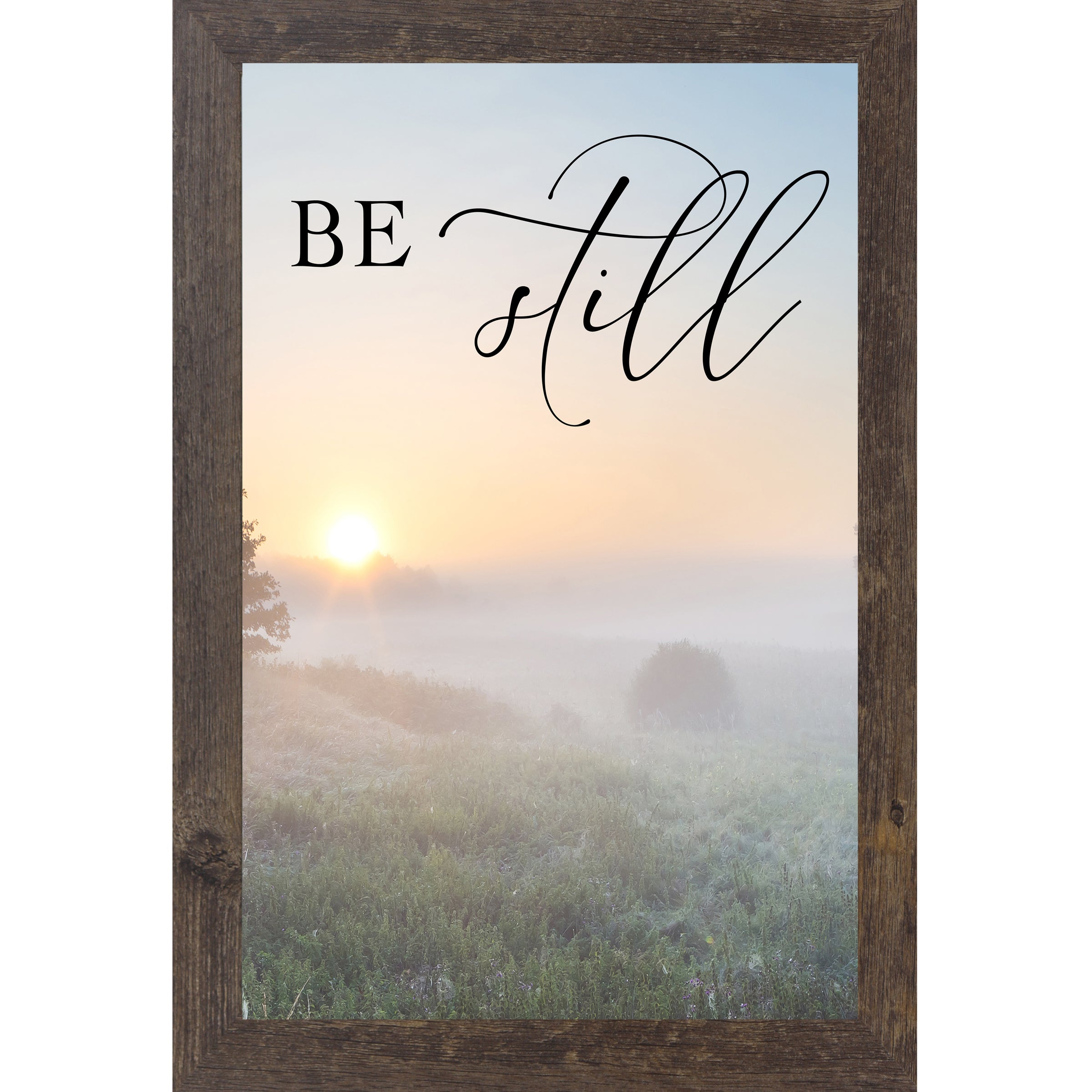 Natural brown framed tall portrait Christian scripture wall art with misty sunrise field ground fog silhouetted trees and the words "Be Still" Psalm 46:10 — 27x40 inches