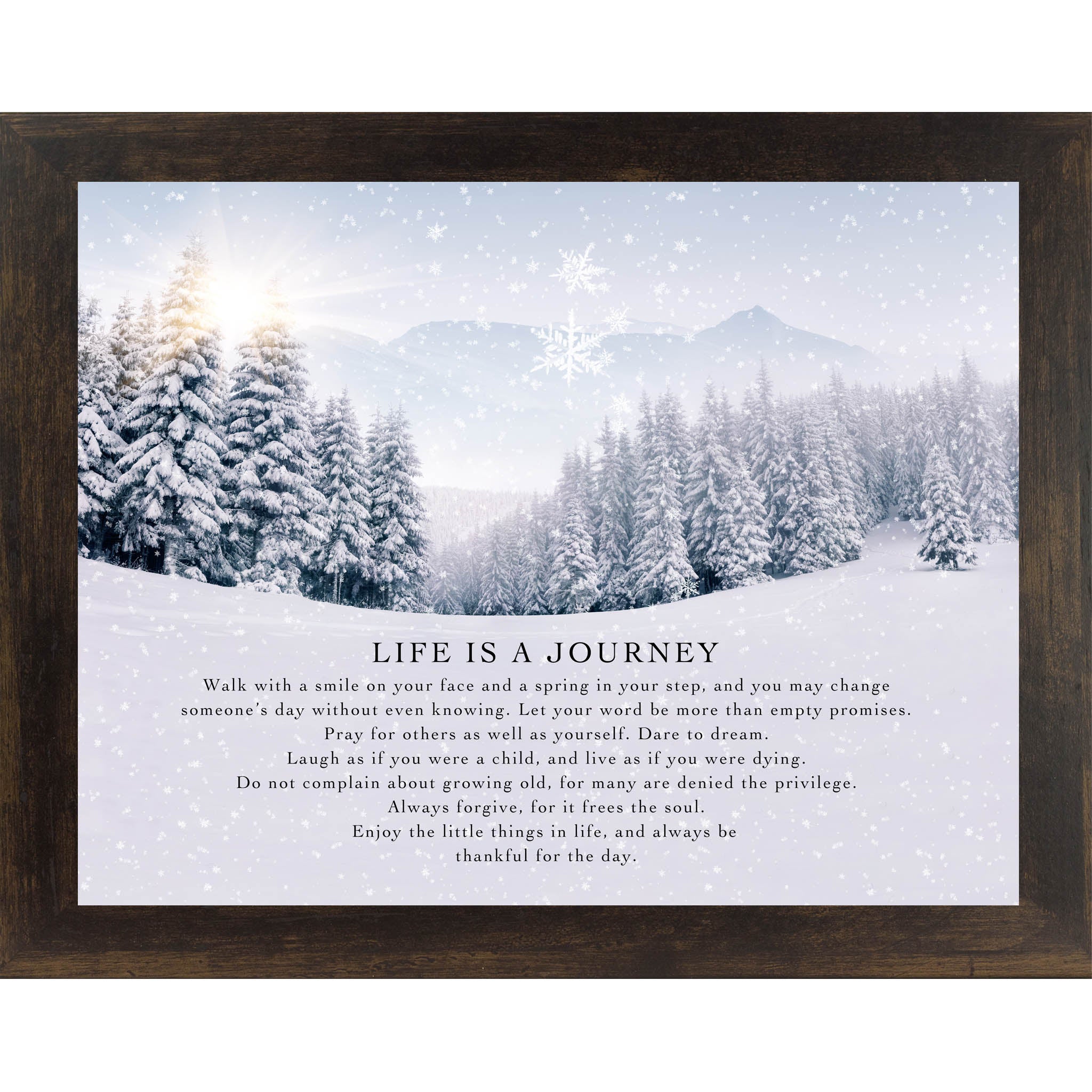 Espresso framed landscape winter wall art featuring a sunlit snowy pine forest with falling snowflakes and the words "Life Is A Journey" followed by an inspirational life philosophy