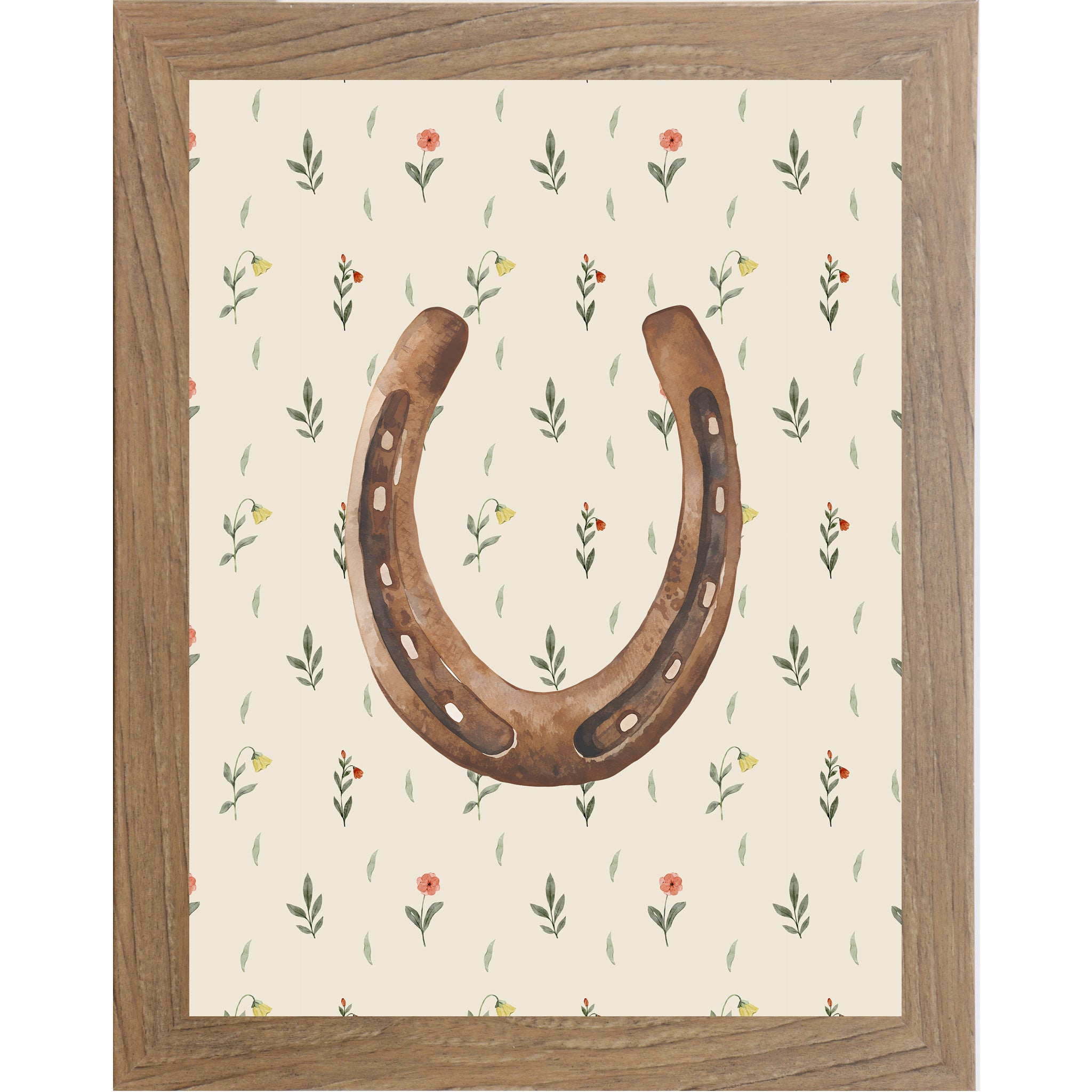 Farmtable framed portrait horseshoe wall art with warm brown watercolor horseshoe open end up on soft cream scattered wildflower floral background — western cowgirl good luck decor