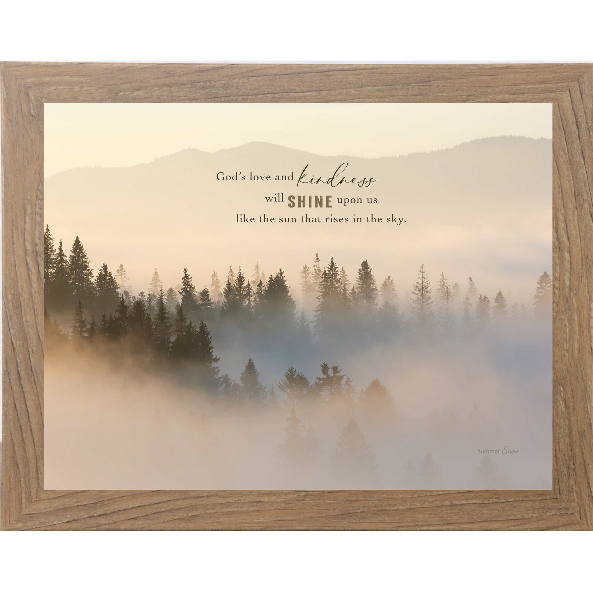Christian mountain wall art in horizontal format featuring misty evergreen forest at sunrise with inspirational quote about God’s love and kindness shining like the rising sun.