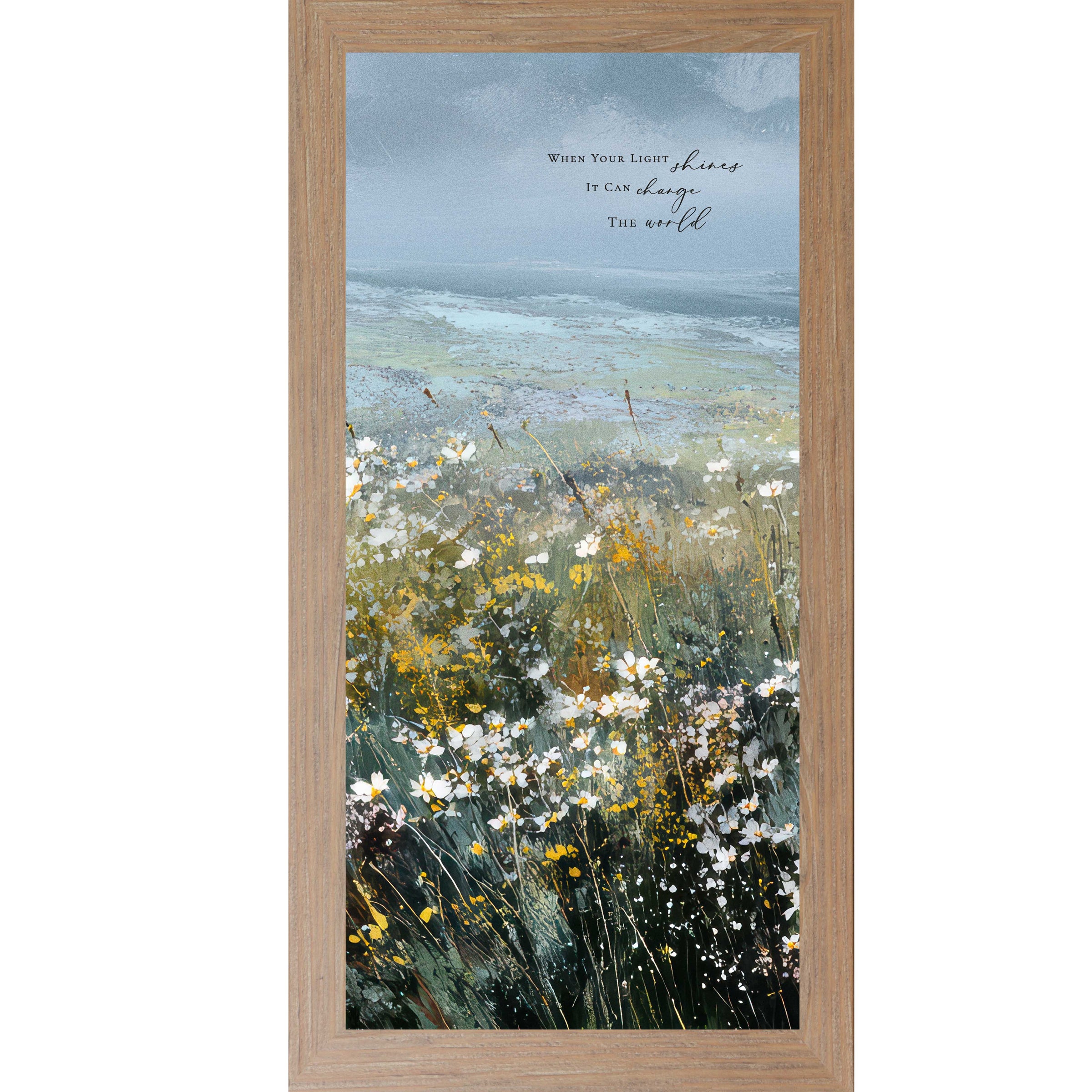 Farmtable color Framed inspirational wall art featuring a watercolor meadow of wildflowers in bloom with rolling fields and a soft blue sky. The artwork includes the quote “When Your Light Shines It Can Change The World.”