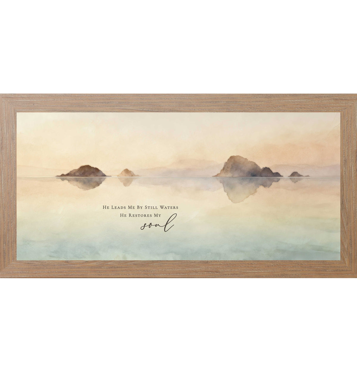 Framed Christian lake wall art featuring calm still water reflections with the words “He Leads Me by Still Waters, He Restores My Soul” in a wide horizontal watercolor landscape.