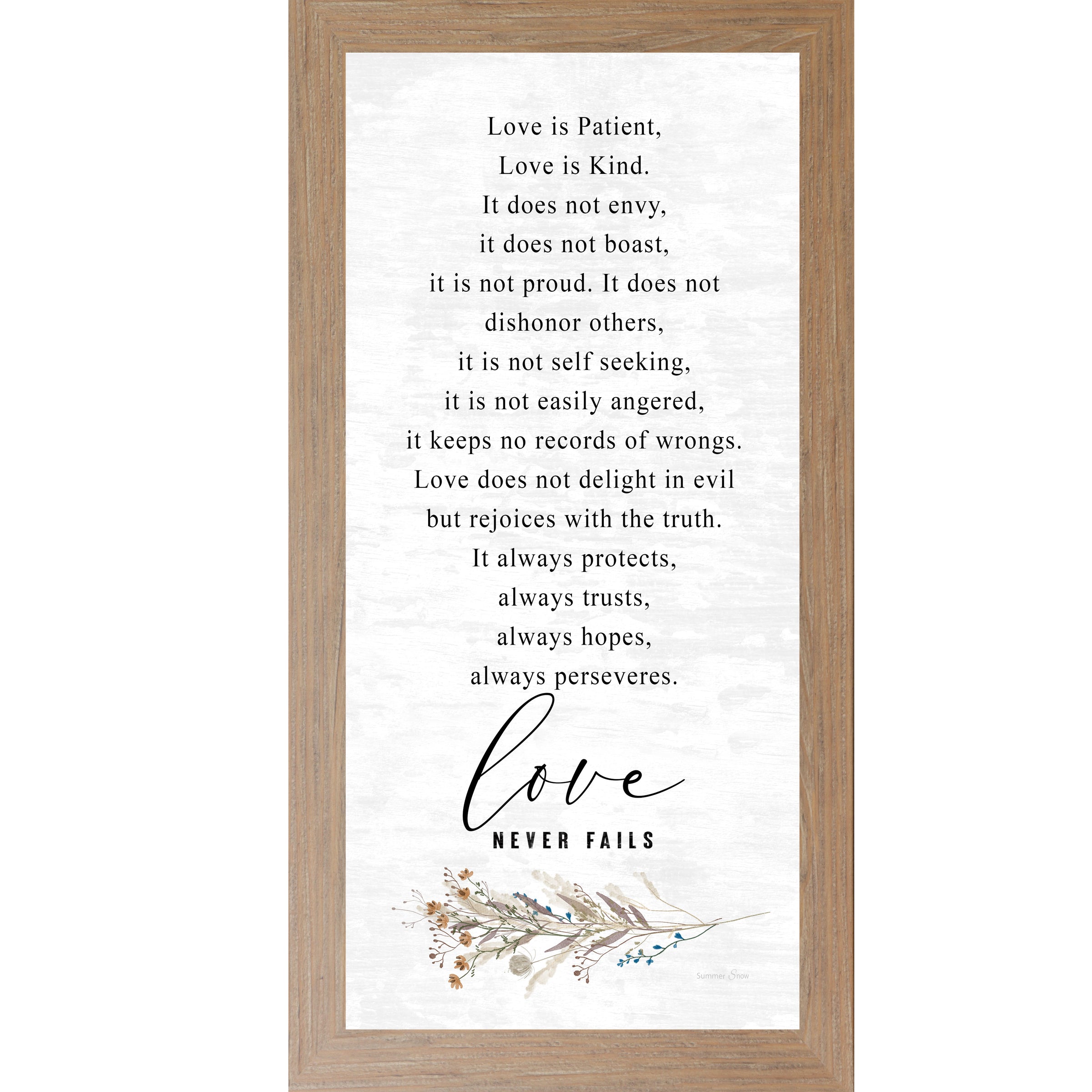 Farmtable framed tall portrait Christian wall art featuring the full 1 Corinthians 13 scripture in elegant serif and flowing script with wildflower botanical sprig and the words "love Never Fails" — SN700