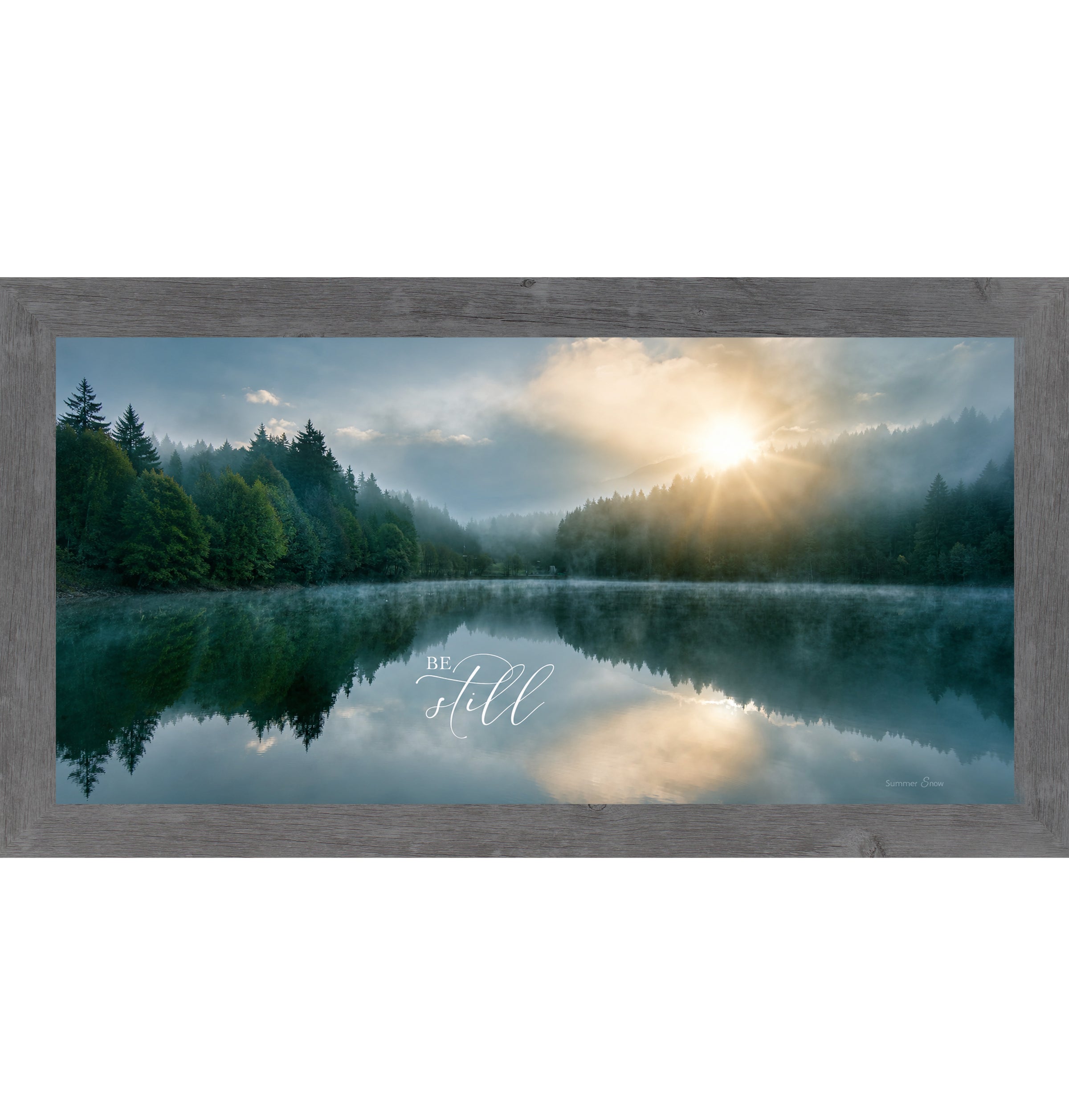 Gray framed wide landscape Christian scripture wall art featuring misty lake sunrise with pine forest reflection and golden sun with the words Be Still — SB765