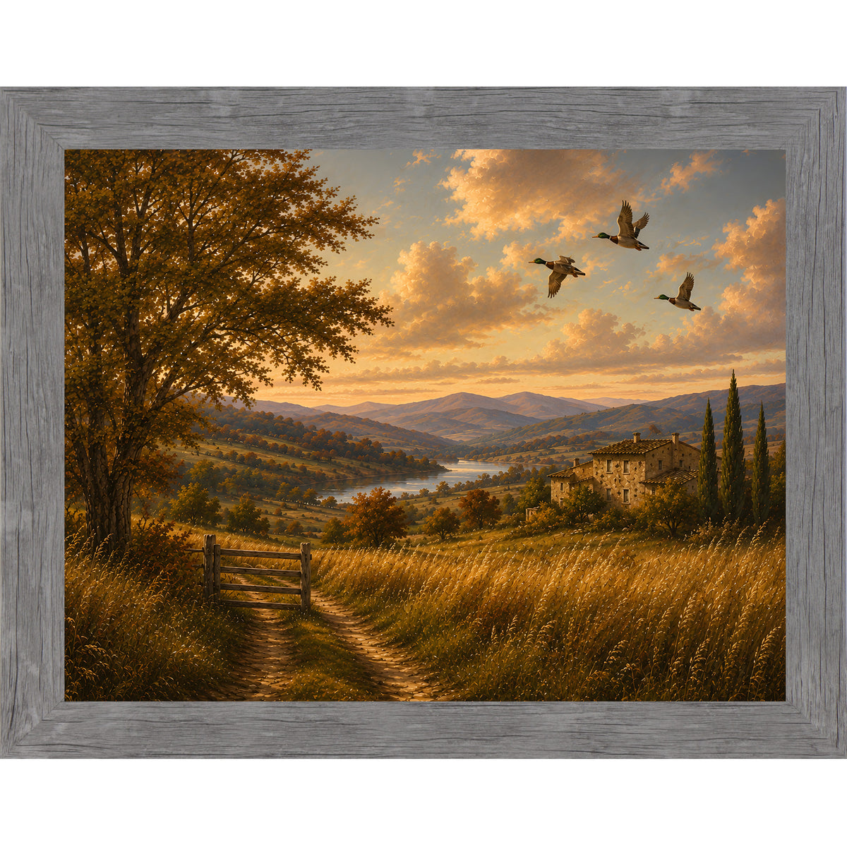 Gray framed landscape vintage sporting wall art featuring mallards flying over a golden river valley with a distant countryside villa