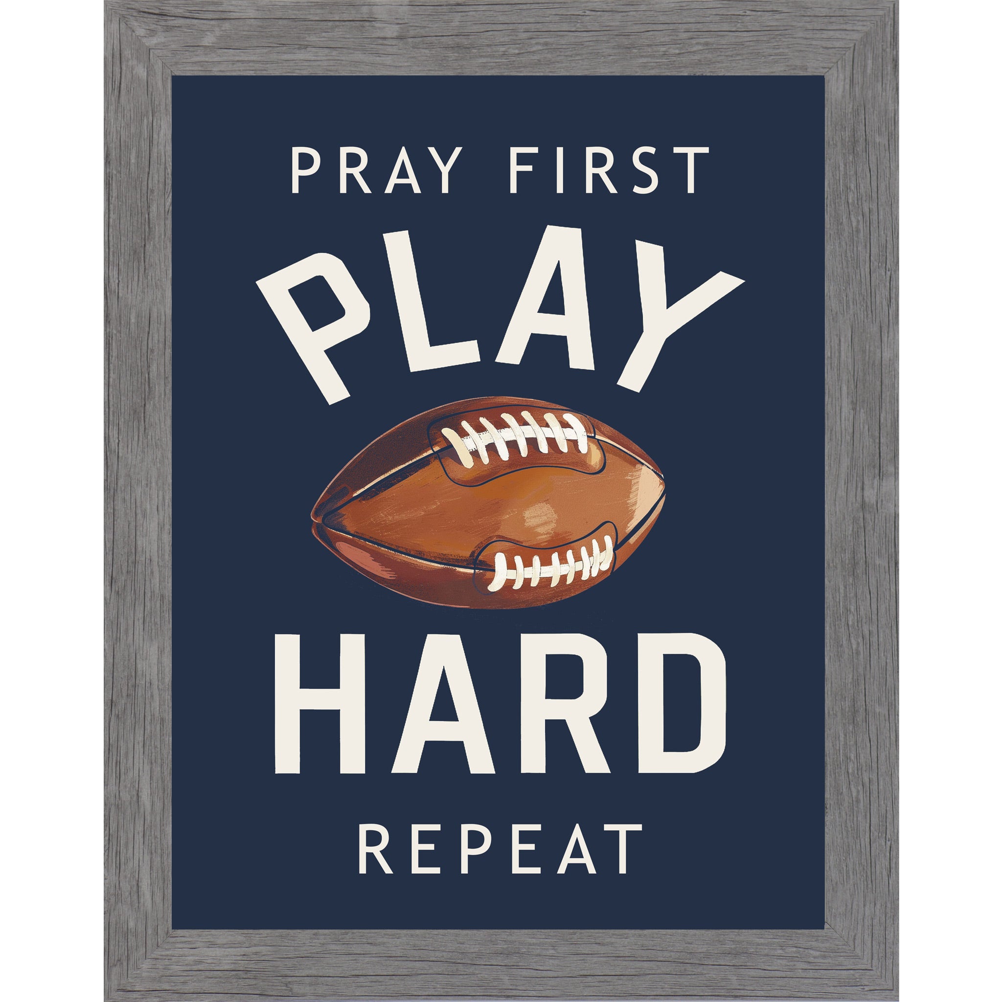 Gray framed portrait Christian football wall art on navy blue background with bold cream varsity typography and vivid watercolor football with the words Pray First Play Hard Repeat — SB260