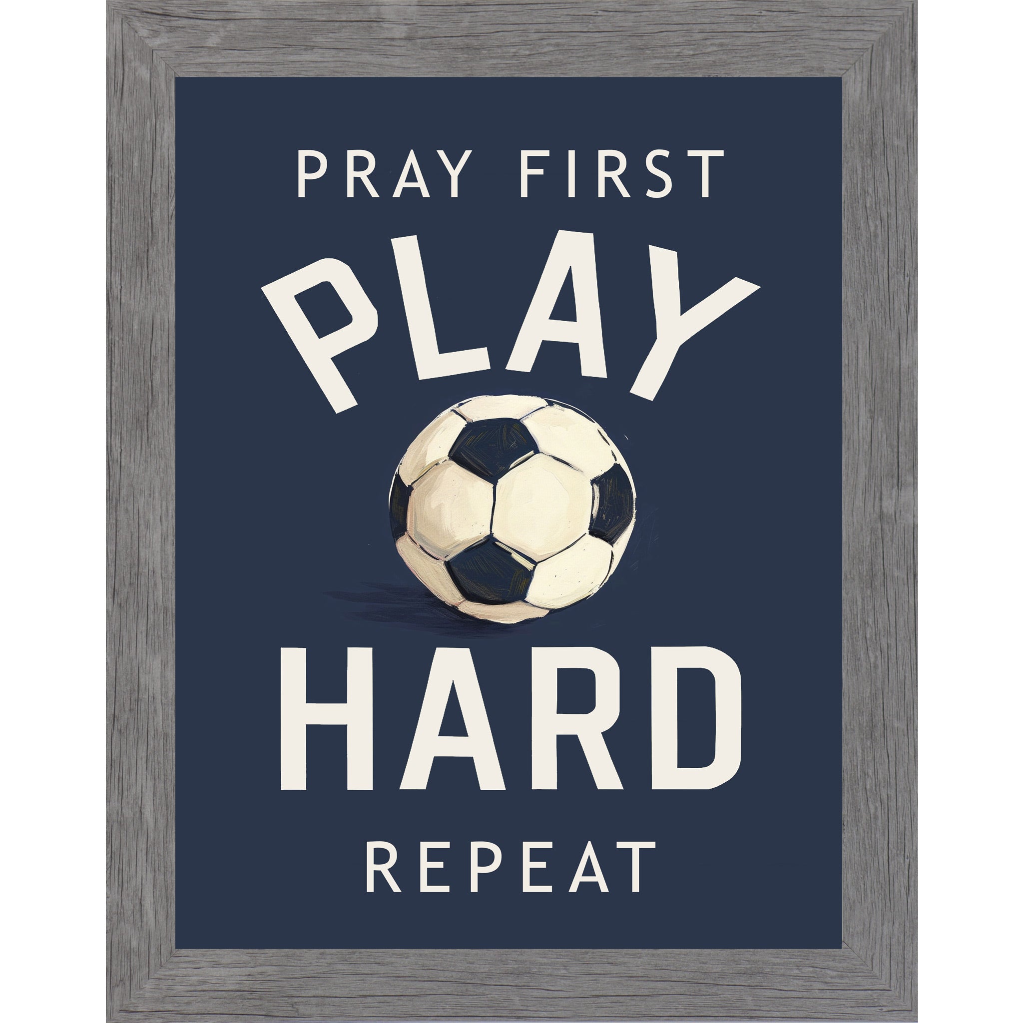 Gray framed portrait Christian soccer wall art on navy blue background with bold cream varsity typography and vivid watercolor soccer ball with the words Pray First Play Hard Repeat — SB261