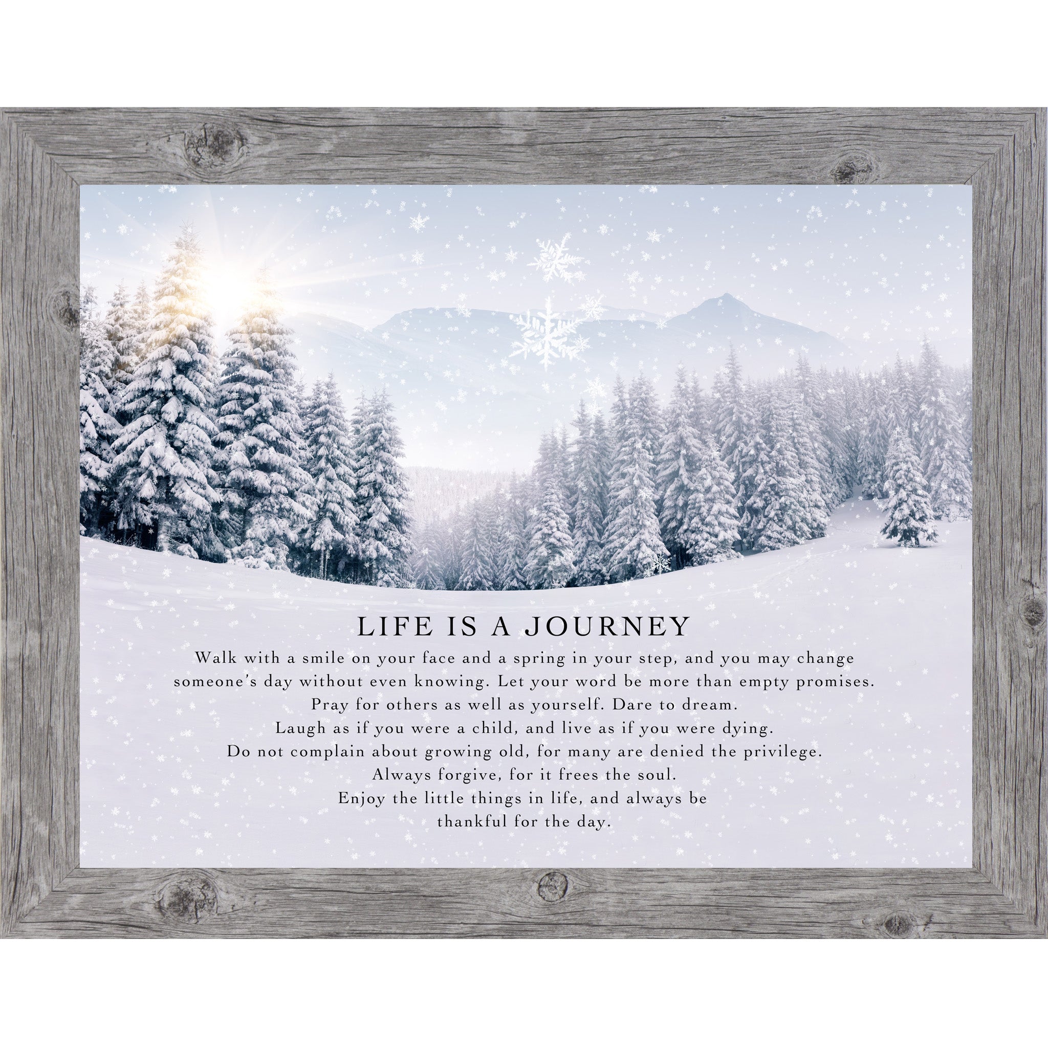Gray framed landscape winter wall art featuring a sunlit snowy pine forest with falling snowflakes and the words "Life Is A Journey" followed by an inspirational life philosophy