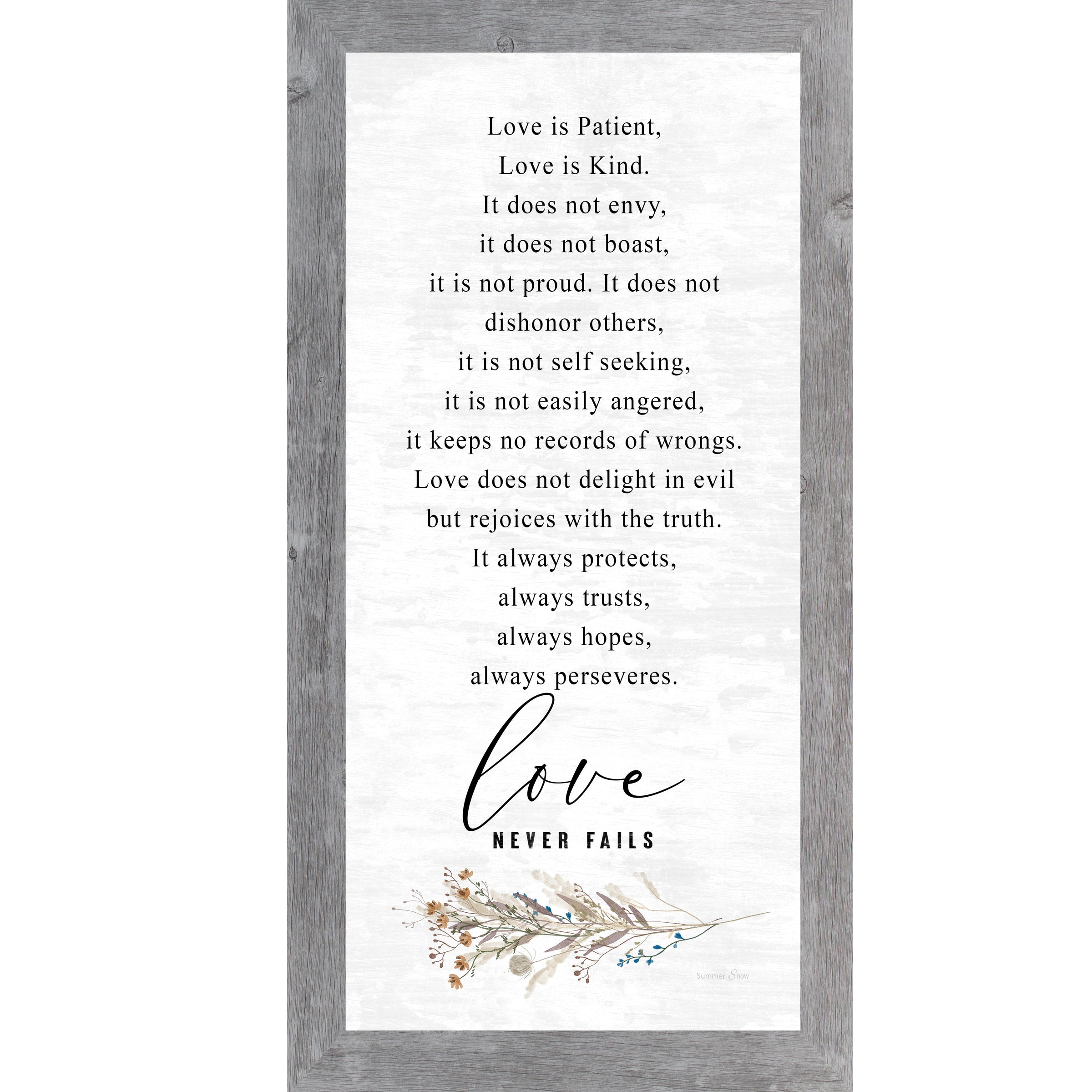 Gray framed tall portrait Christian wall art featuring the full 1 Corinthians 13 scripture in elegant serif and flowing script with wildflower botanical sprig and the words "love Never Fails" — SN700