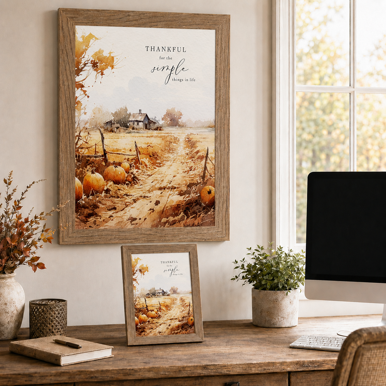 Farmtable framed Thankful for the Simple Things fall pumpkin farm lane wall art SN389 displayed large on home office wall beside window with fall view — fall branches in vase and 8x10 easel back on wood desk — watercolor pumpkin field with golden lane split-rail fence and distant farmhouse in warm amber rust and gold tones with Thankful for the Simple Things typography