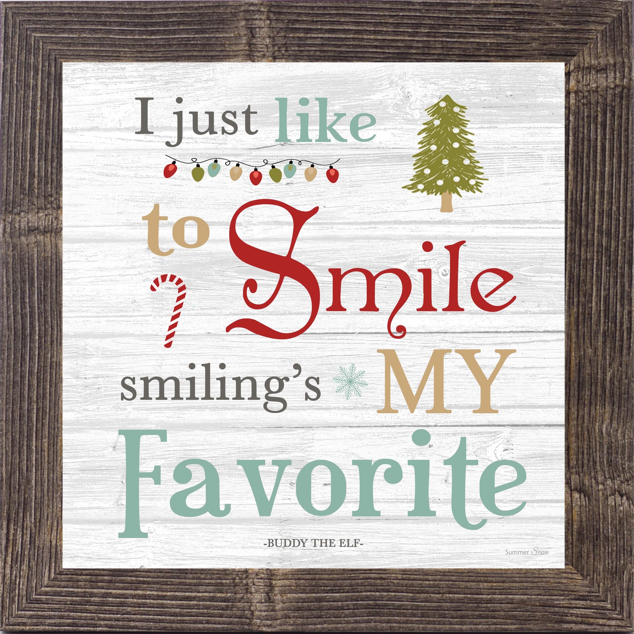 Buddy the Elf Christmas wall art with the quote “I just like to smile, smiling’s my favorite” on a white slatted wood background