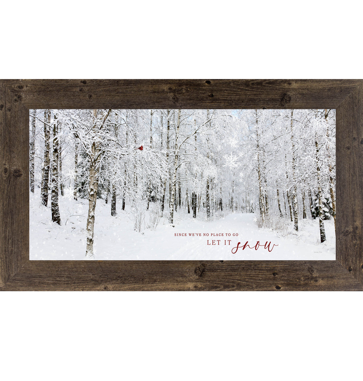 Winter framed wall art featuring a snow-covered forest trail with bare trees, falling snowflakes, and a red cardinal perched on a branch