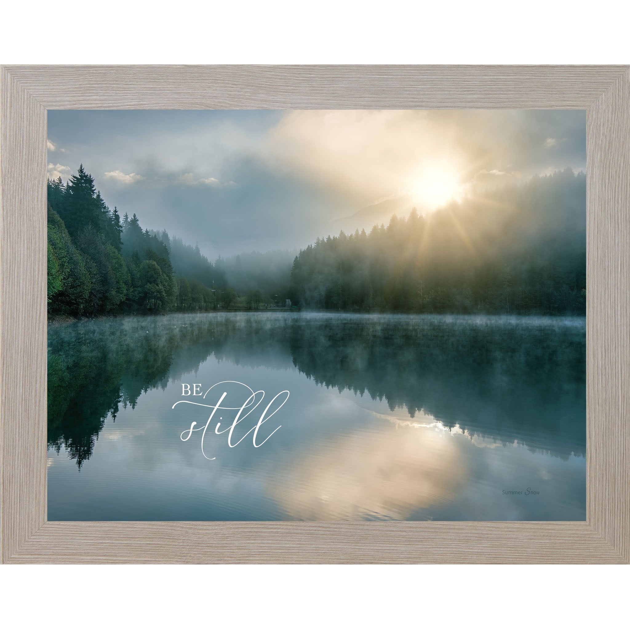 Monte Carlo framed landscape Christian wall art with realistic lake reflection of trees and sunrise with the words "Be Still" reflected in the water Psalm 46:10
