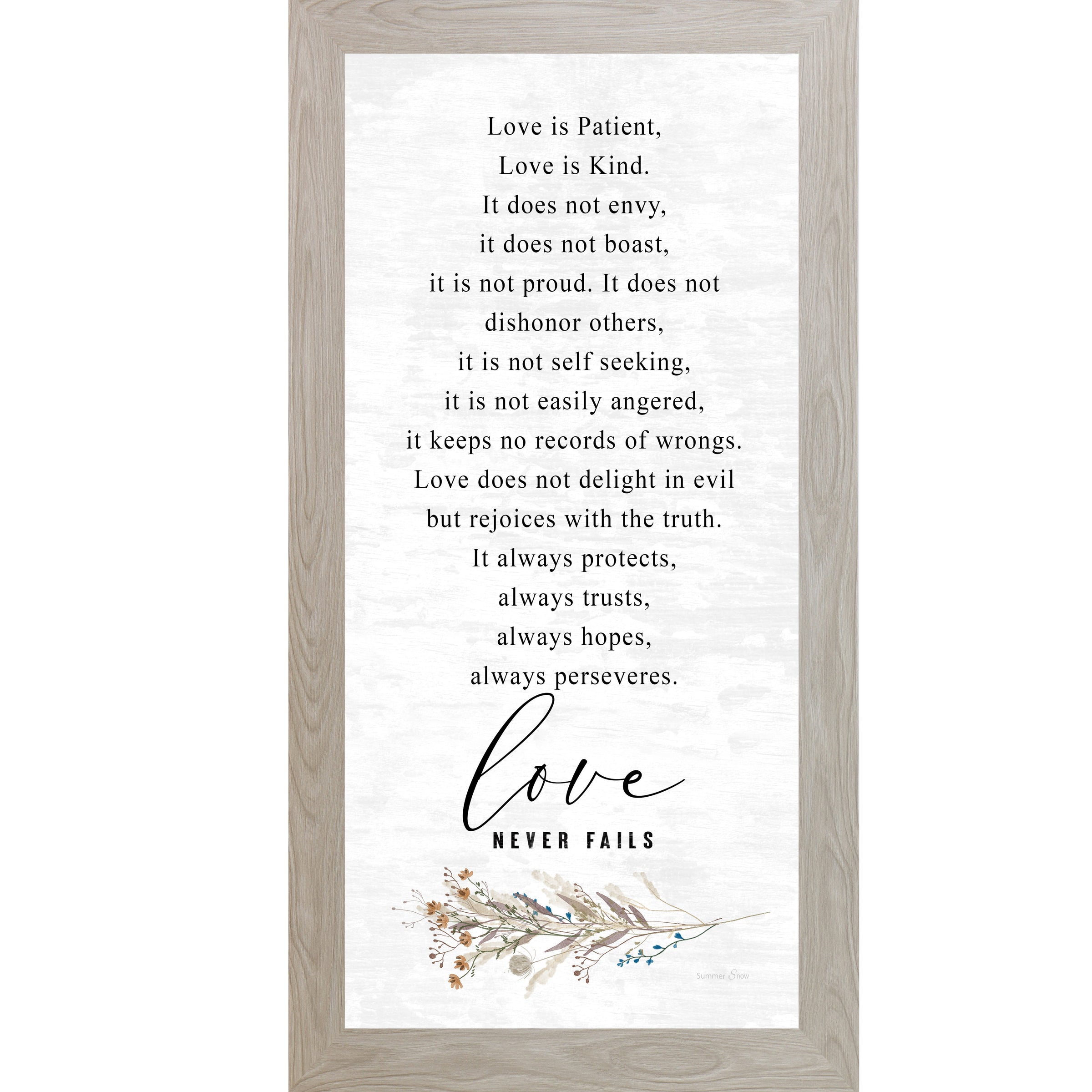 Monte Carlo framed tall portrait Christian wall art featuring the full 1 Corinthians 13 scripture in elegant serif and flowing script with wildflower botanical sprig and the words "love Never Fails" — SN700