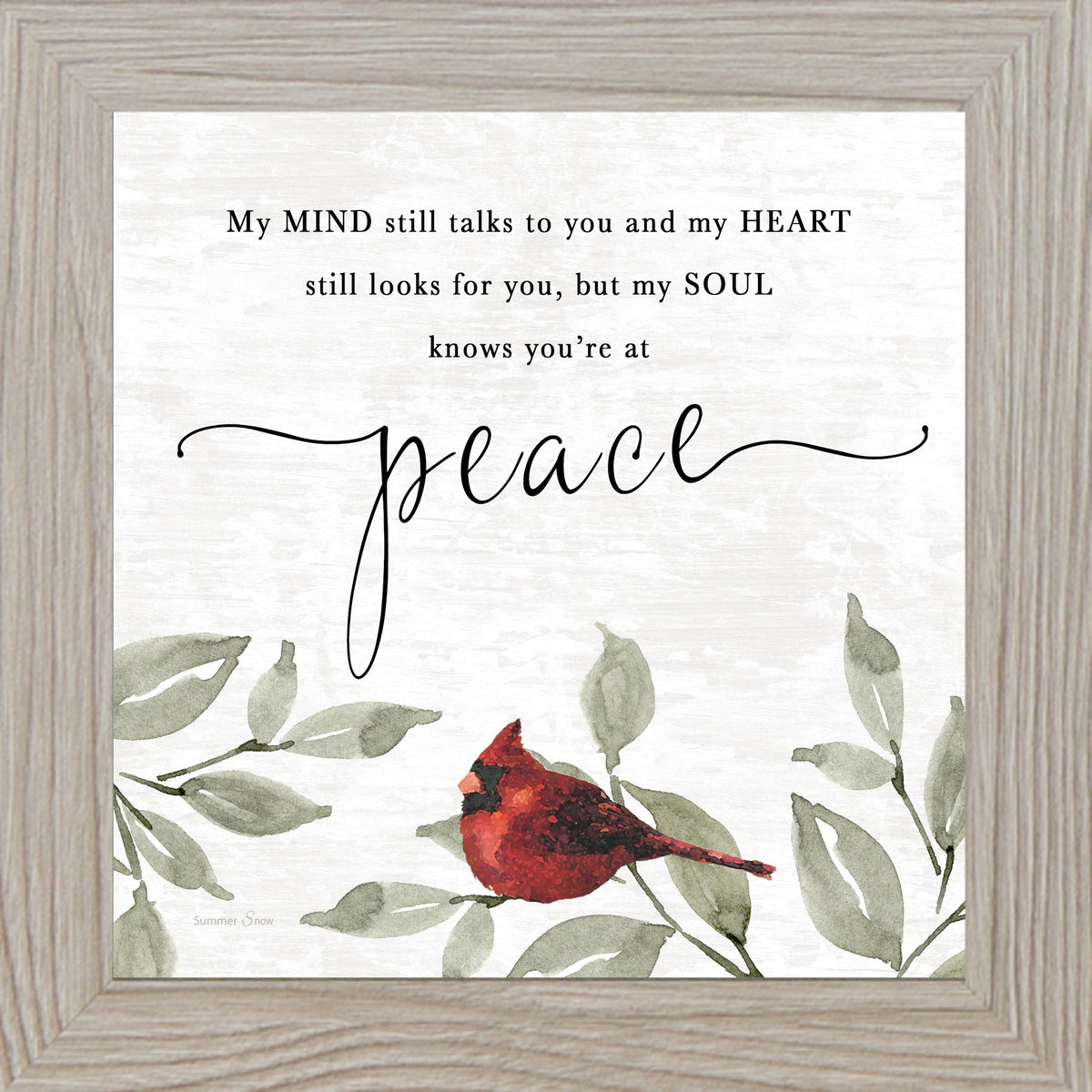 Framed sympathy wall art with a watercolor cardinal perched on green leaves and the quote “My soul knows you’re at peace,” displayed on a soft neutral textured background.