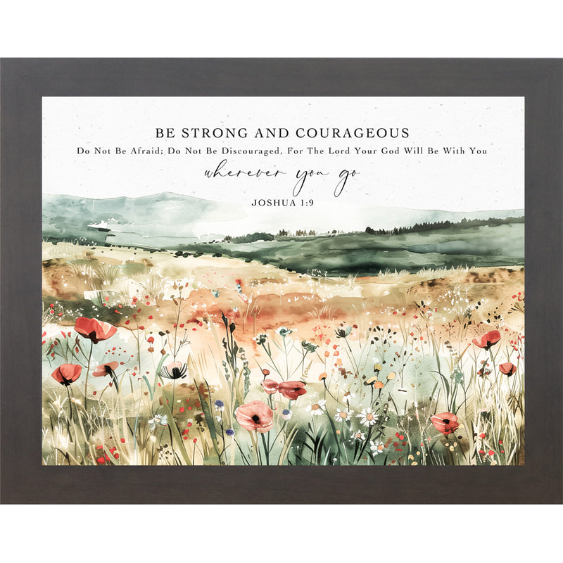 Framed watercolor wall art with green hills, soft field, and the scripture quote “Be Strong and Courageous”