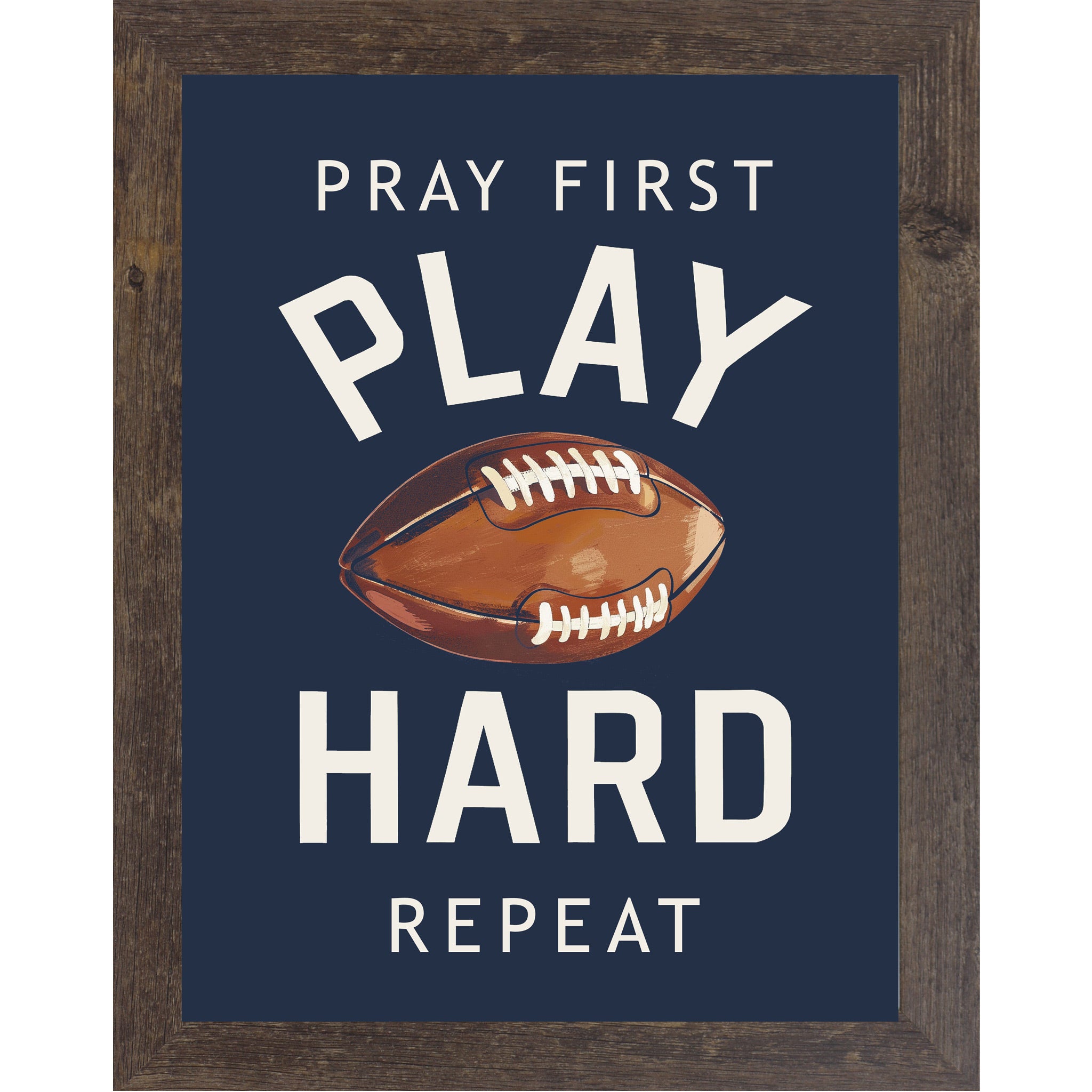 Natural Brown framed portrait Christian football wall art on navy blue background with bold cream varsity typography and vivid watercolor football with the words Pray First Play Hard Repeat — SB260