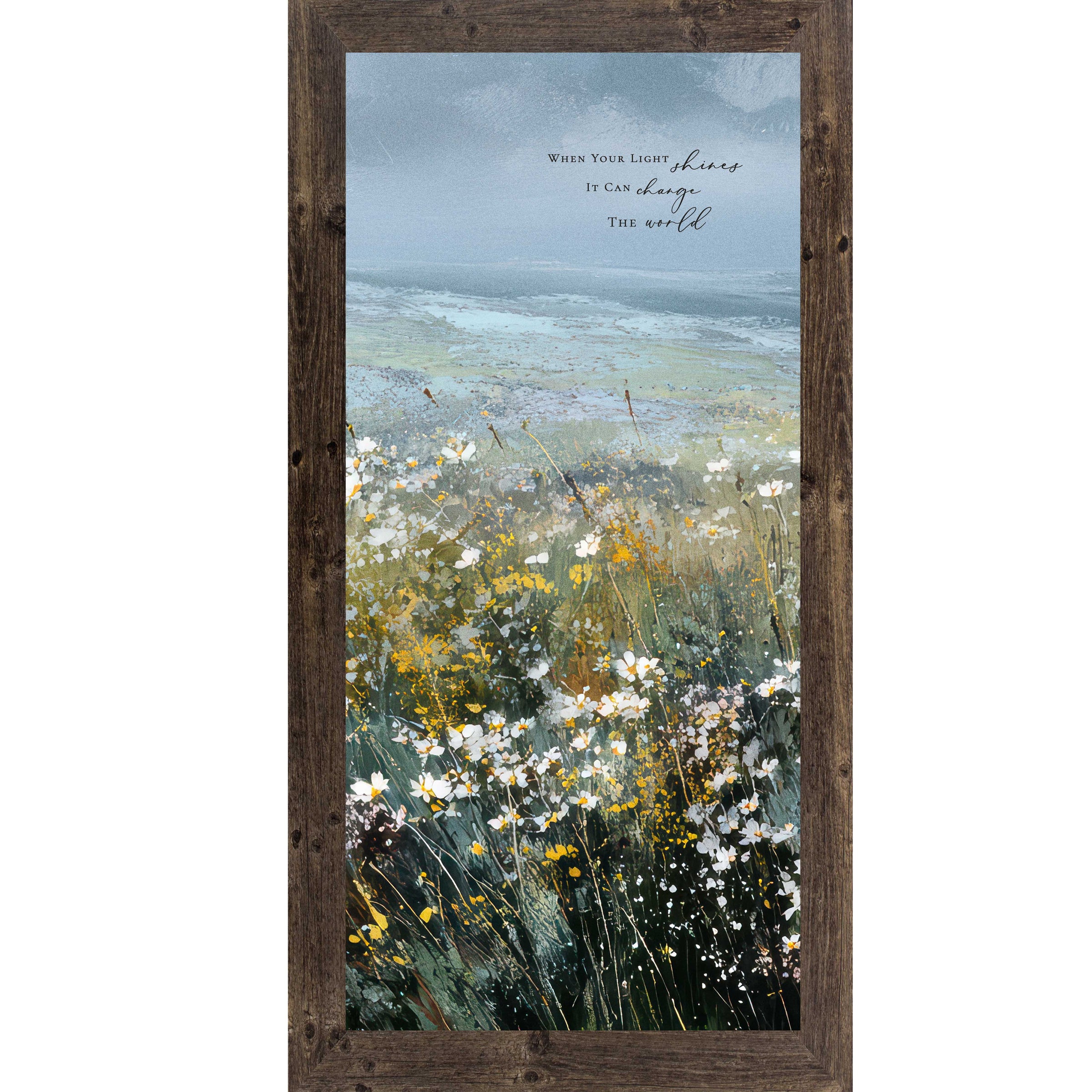 Natural brown color Framed inspirational wall art featuring a watercolor meadow of wildflowers in bloom with rolling fields and a soft blue sky. The artwork includes the quote “When Your Light Shines It Can Change The World.”