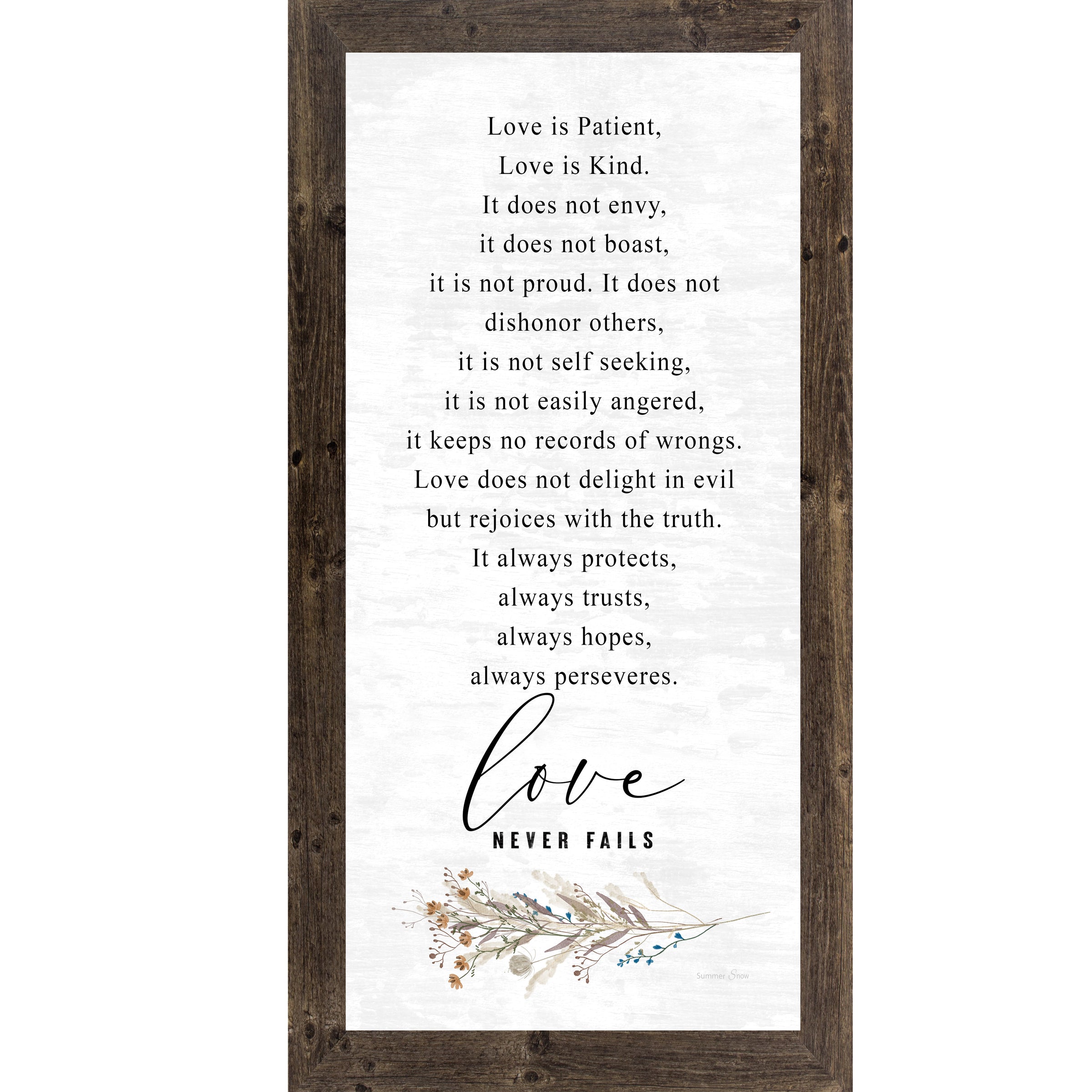 Natural brown framed tall portrait Christian wall art featuring the full 1 Corinthians 13 scripture in elegant serif and flowing script with wildflower botanical sprig and the words "love Never Fails" — SN700