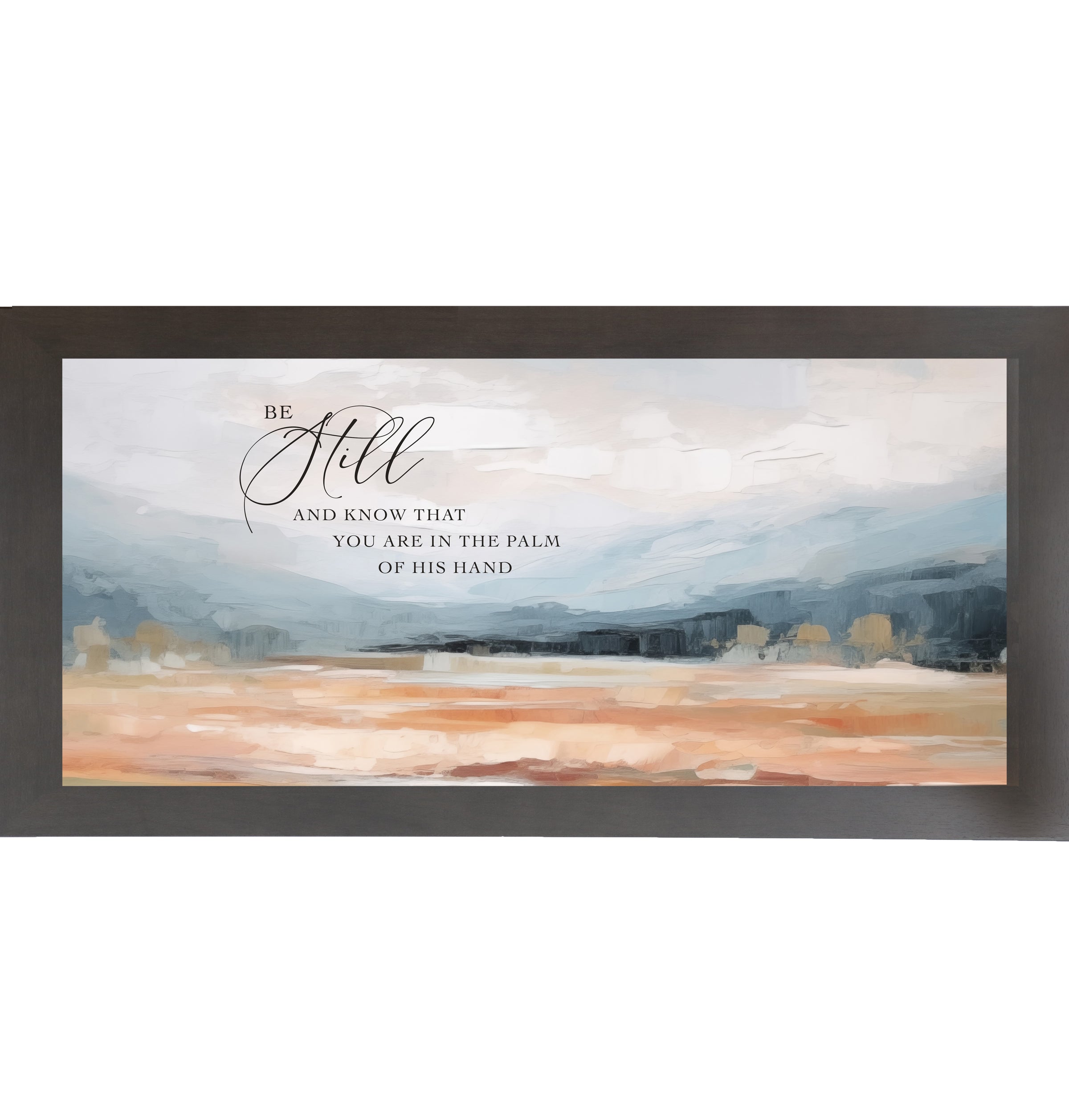 Slatewood framed wide landscape Christian wall art with Be Still And Know That You Are In The Palm Of His Hand scripture in oversized script over dramatic blue-grey mountains and soft peach blush terracotta field