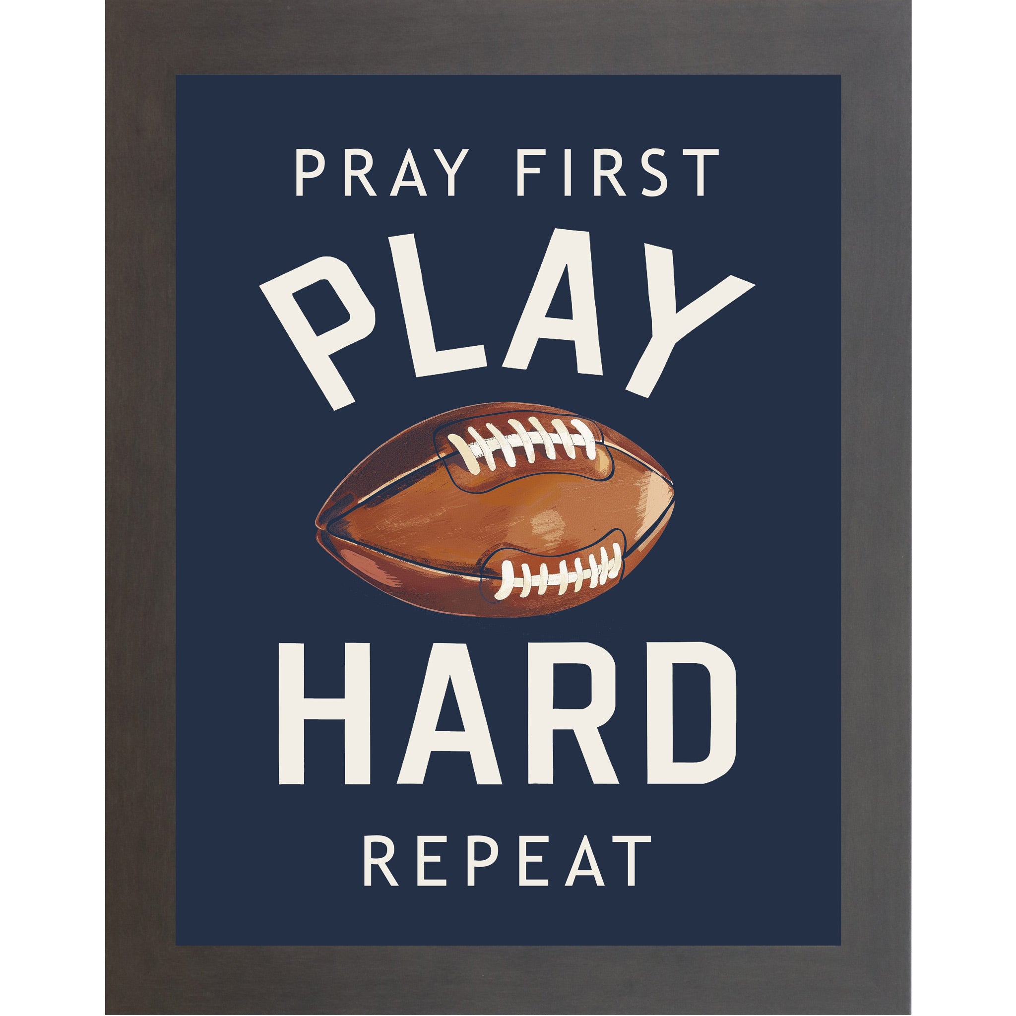 Slatewood framed portrait Christian football wall art on navy blue background with bold cream varsity typography and vivid watercolor football with the words Pray First Play Hard Repeat — SB260