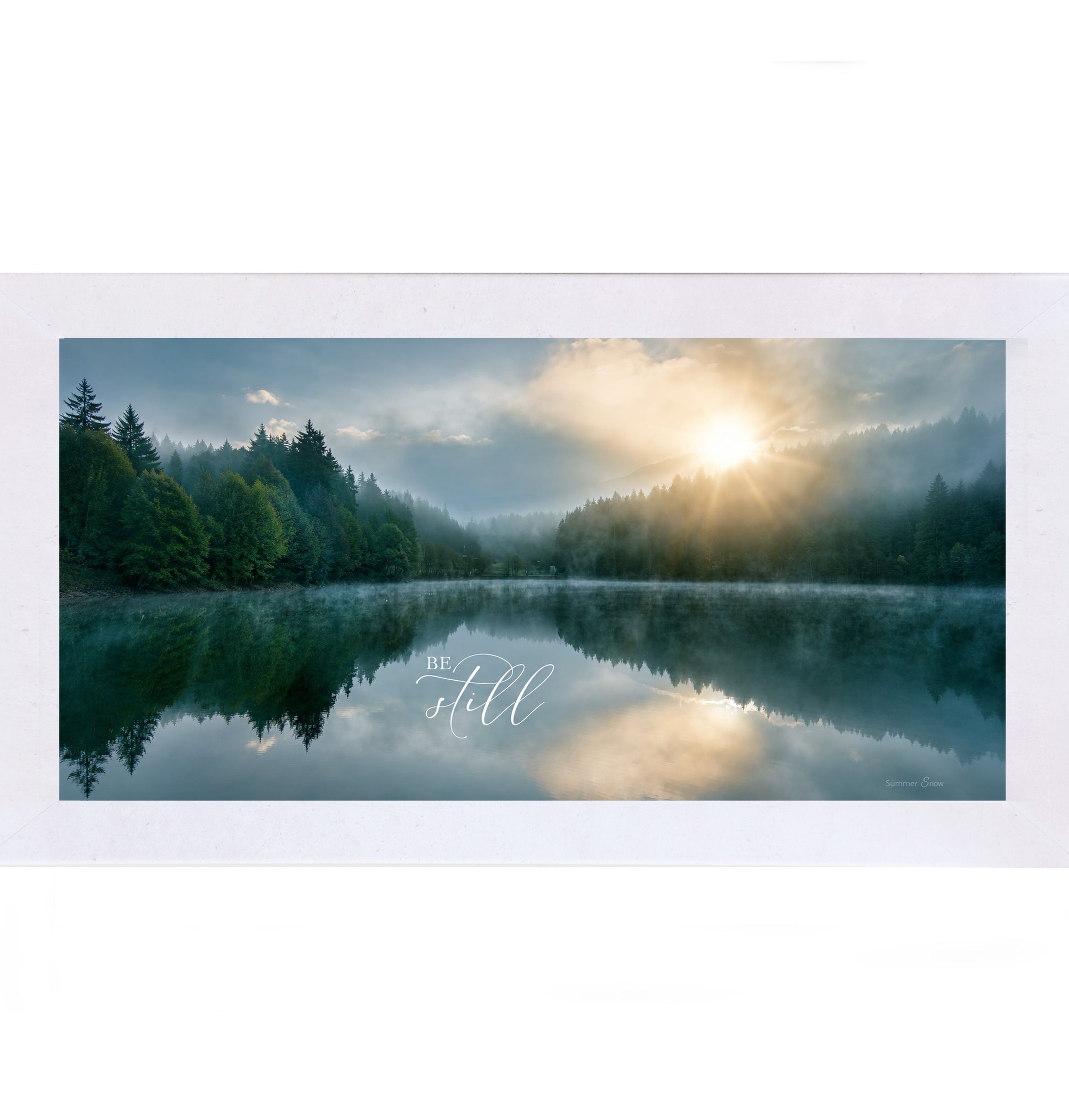 Terracotta White framed wide landscape Christian scripture wall art featuring misty lake sunrise with pine forest reflection and golden sun with the words Be Still — SB765