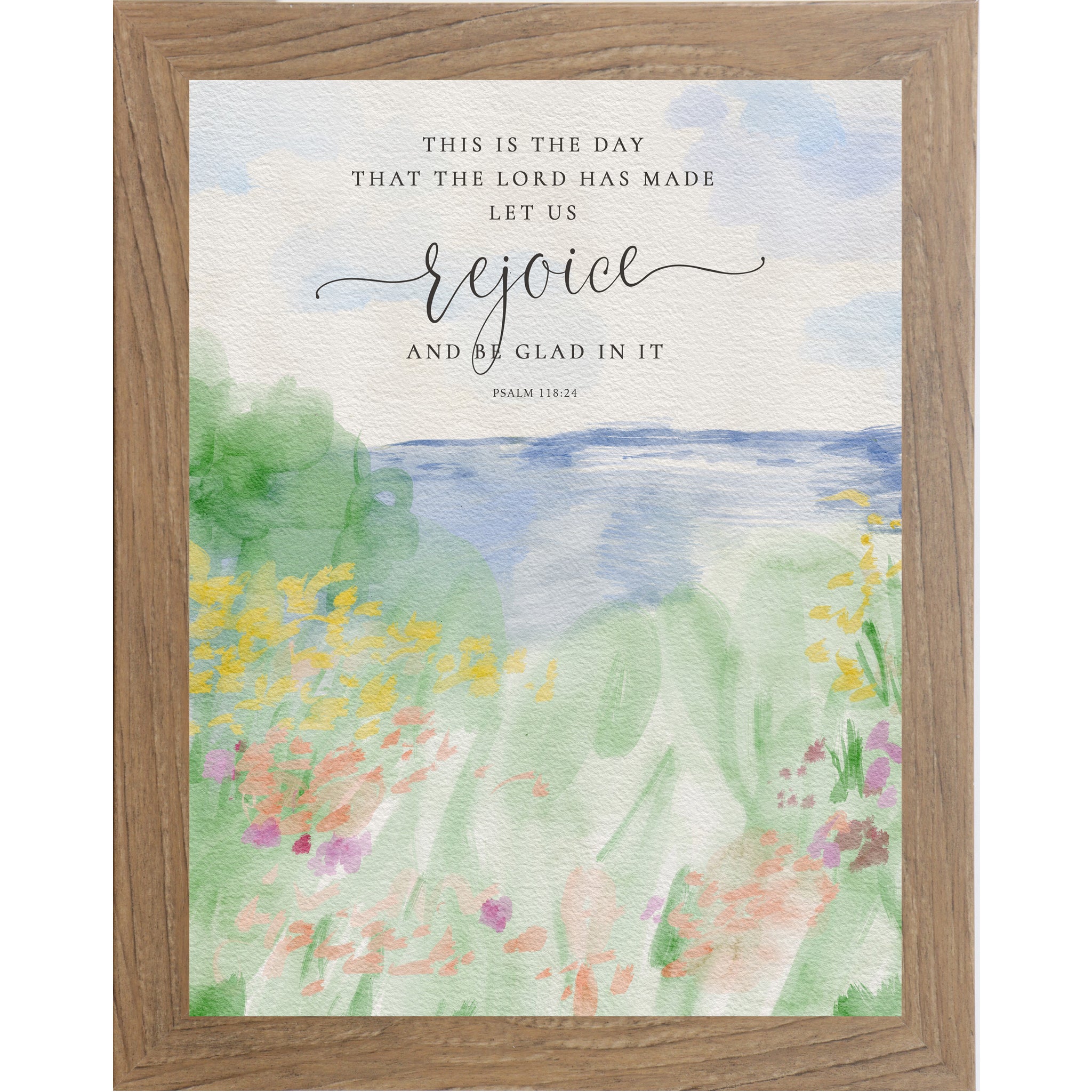 Watercolor Christian wall art featuring Psalm 118:24 over a soft abstract landscape of flowers, greenery, sky, and water