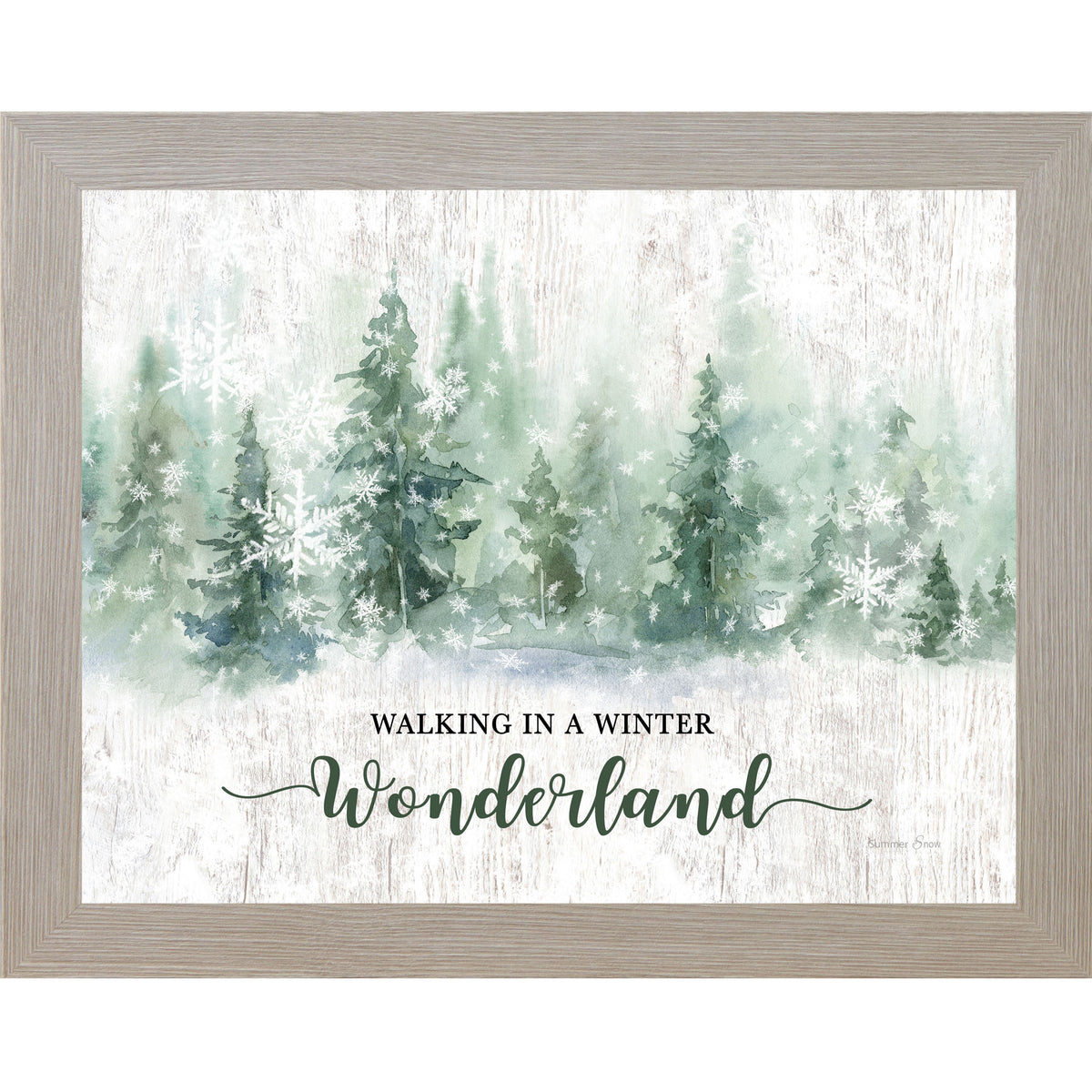 Framed winter wall art featuring watercolor evergreen trees and snowflakes across a white slatted wood background with the words Walking in a Winter Wonderland