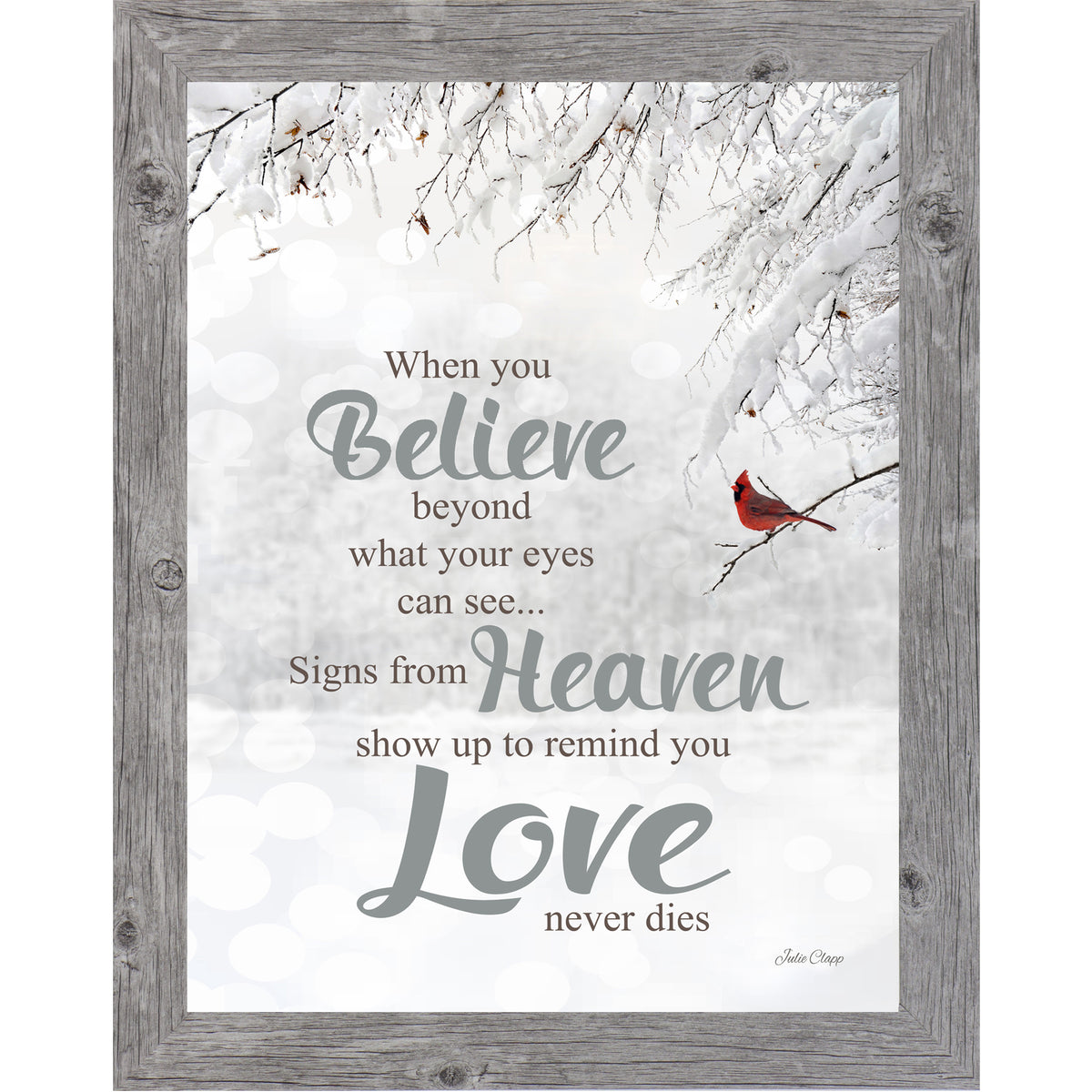 Vertical framed wall art featuring a red cardinal on a winter branch with the words When You Believe on a soft neutral background