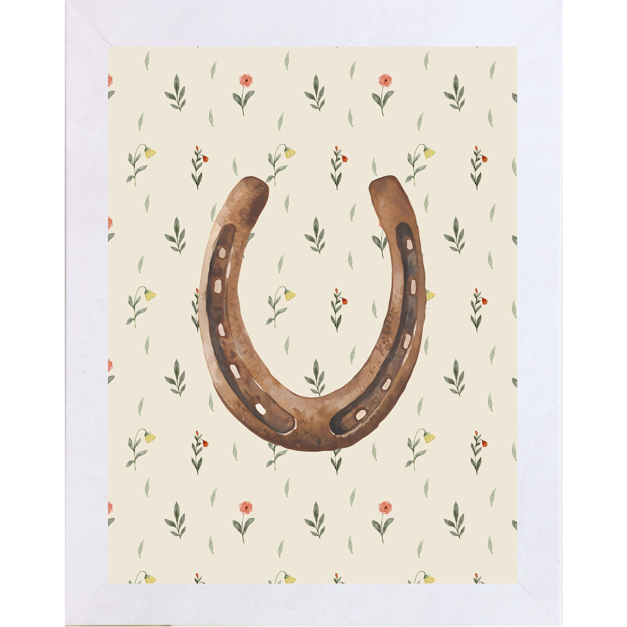 Terracotta white framed portrait horseshoe wall art with warm brown watercolor horseshoe open end up on soft cream scattered wildflower floral background — western cowgirl good luck decor